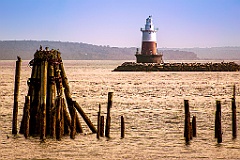 Sun Setting by Old Connecticut Lighthouse with Birds Nesting on